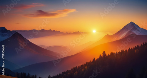 Panorama of sunset in the mountains with forest  green grass and big shining sun on dramatic sky