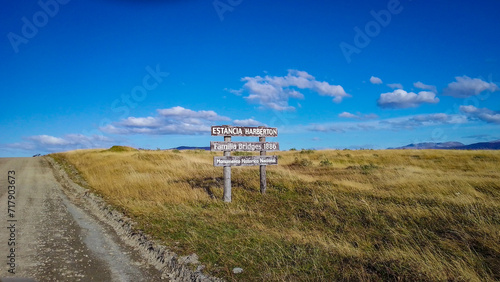Dirt road meadow landscape, tierra del fuego, argentina photo