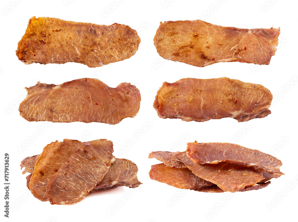 Set og jerky isolate. Pieces of cured pork isolated on white background. Portion of dried pork on white background. Dried pork isolated on white background. Pieces of dry meat.