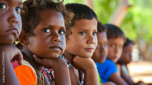 Group of Indigenous Aboriginal children in the Australian bush photo