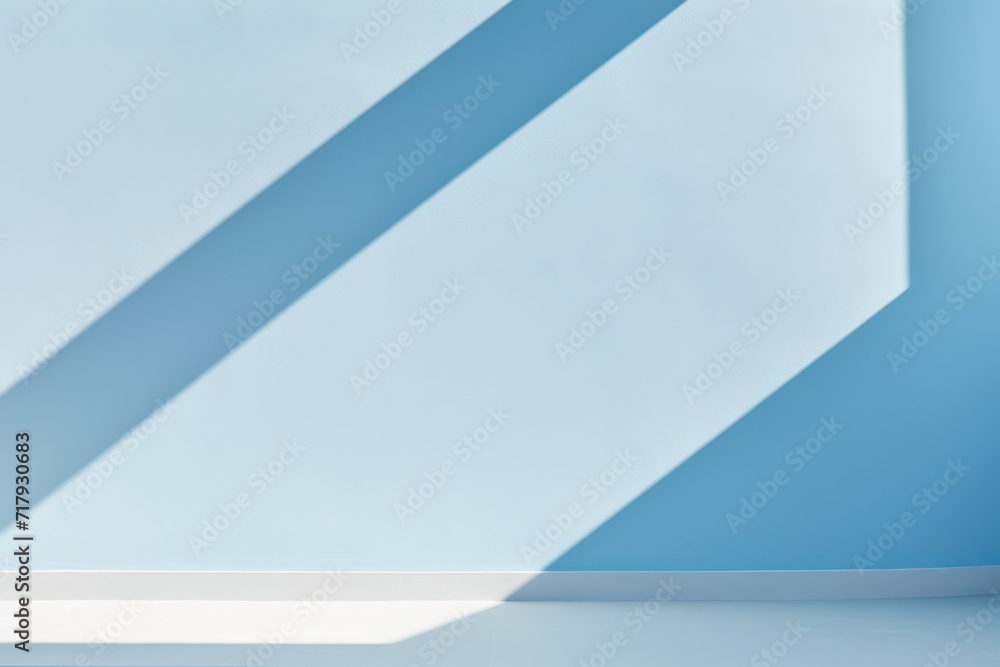 Sunlight cast soft shadows on a minimalist light blue wall. Sunlight cast soft shadows on a minimalist light blue wall.