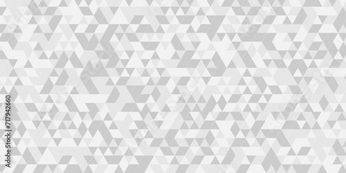 Abstract geometric vector seamless technology gray and white wall tringle backdrop tile wallpaper background. decoration pattern gray Polygon Mosaic triangle, business and corporate background.