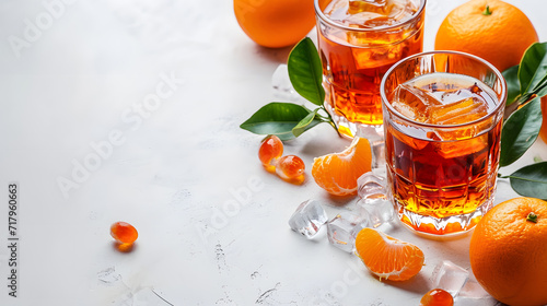 Fresh orange fruits on white table background with  space for text
