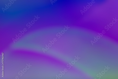 Abstract blurred background image of blue, purple colors gradient used as an illustration. Designing posters or advertisements. © Thawornner