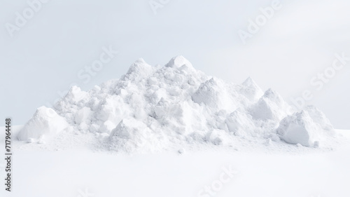 Isolated snow piles and capes against a stark white background photo