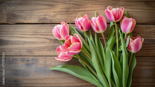 Spring background!A bouquet of tulips on a wooden background.Holiday greeting card for Valentine's Day, Woman's Day, Mother's Day, Easter!