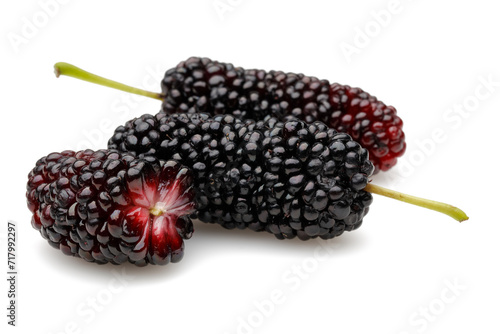 Black mulberries isolated on white background