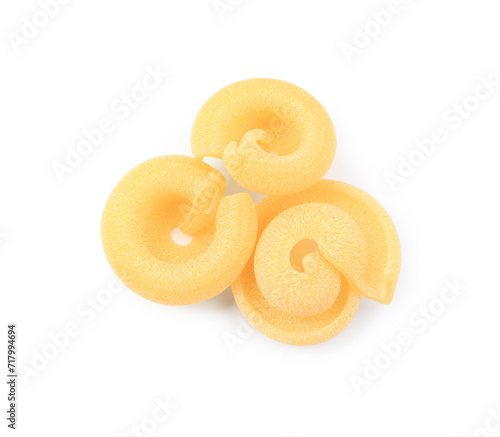 Raw dischi volanti pasta isolated on white, top view