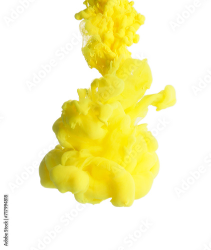 Splash of yellow ink on light background. Space for text