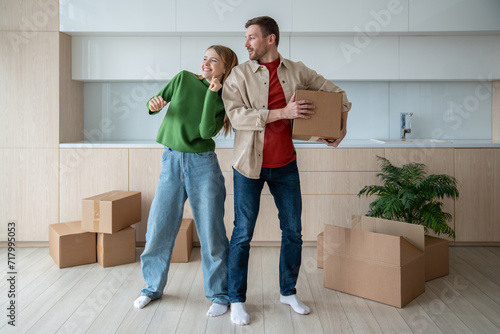 Quadro em tela Joyful happy glad woman dancing in spacious apartment, celebrating flat putchase, independent living, relocation to own new apartment