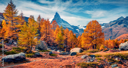 Spectacular morning view of outskirts of Grindjisee lake with Matterhorn (Cervino) peak on background. Stunning autumn scene of Swiss Alps, Zermatt resort location, Switzerland, Europe.