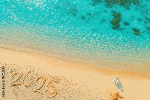 An enchanting aerial view captures the numbers "2025" etched into a golden sandy beach, embraced by the beauty of a crystal-clear sea
