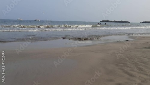 Beautiful View of The  Indian ocean Waves on Nagaon beach in Diu, Gujarat, India. High Quality Video Footage. photo