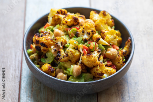 Vegan salad with chickpea, roast cauliflower and avocado