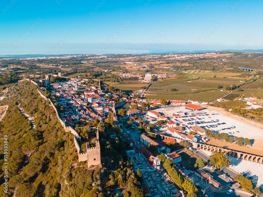 Above Óbidos: Aerial Vistas of the Enchanting Portuguese Village Nestled Amidst Historic Walls and Lush Greenery