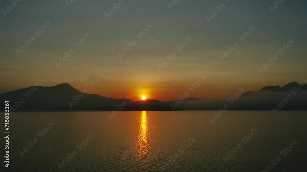 Time-lapse of sunrise in the mountains above the reservoir. Time-lapse of sunrise in the mountains above the reservoir.