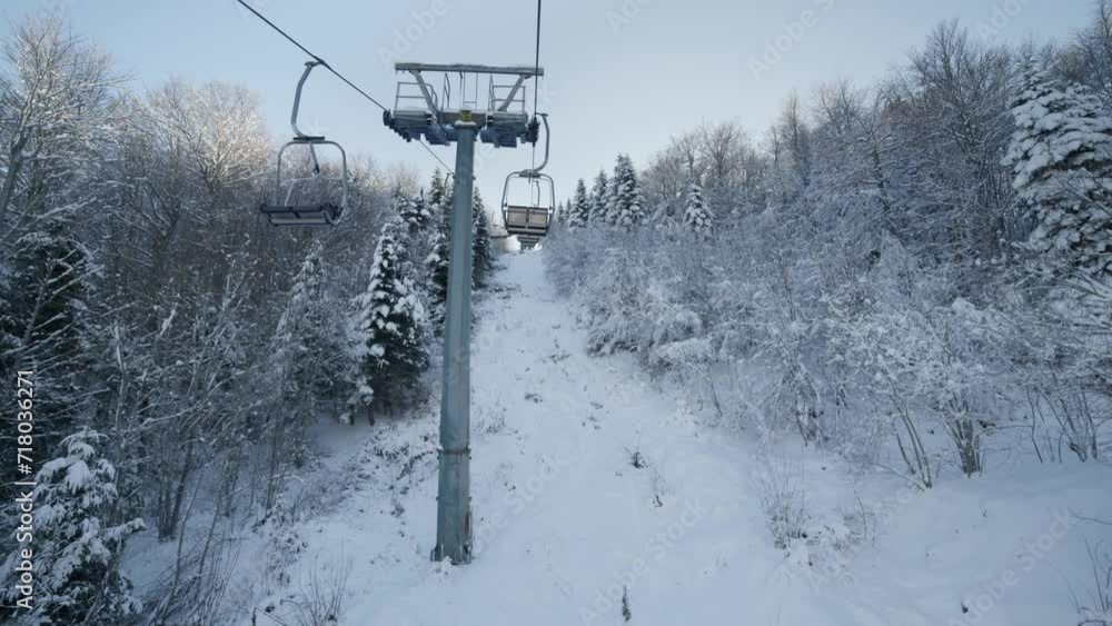 Pov riding ski lifts winter snow covered slopes sunny day Pov riding ski lifts winter snow covered slopes sunny day