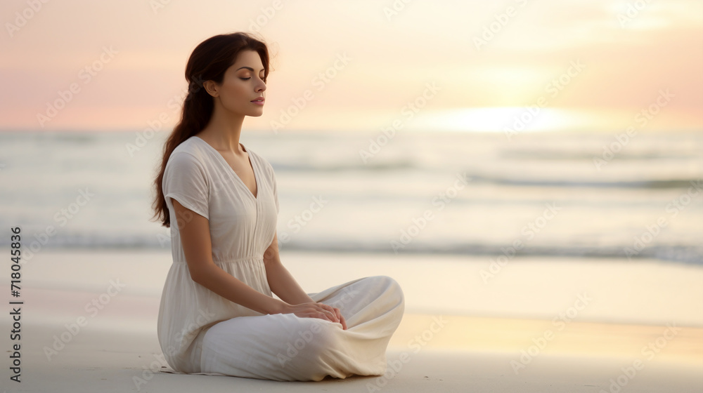Woman in white meditating on the beach at sunset - generative AI