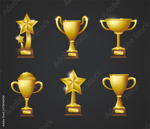 Set of golden awards trophies and cups