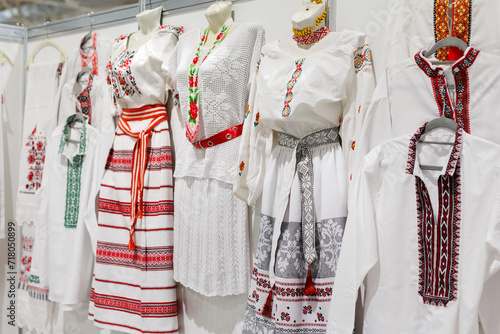 Traditional colorful women's dresses with embroidery. Fashionable handmade style. © Artem Zakharov