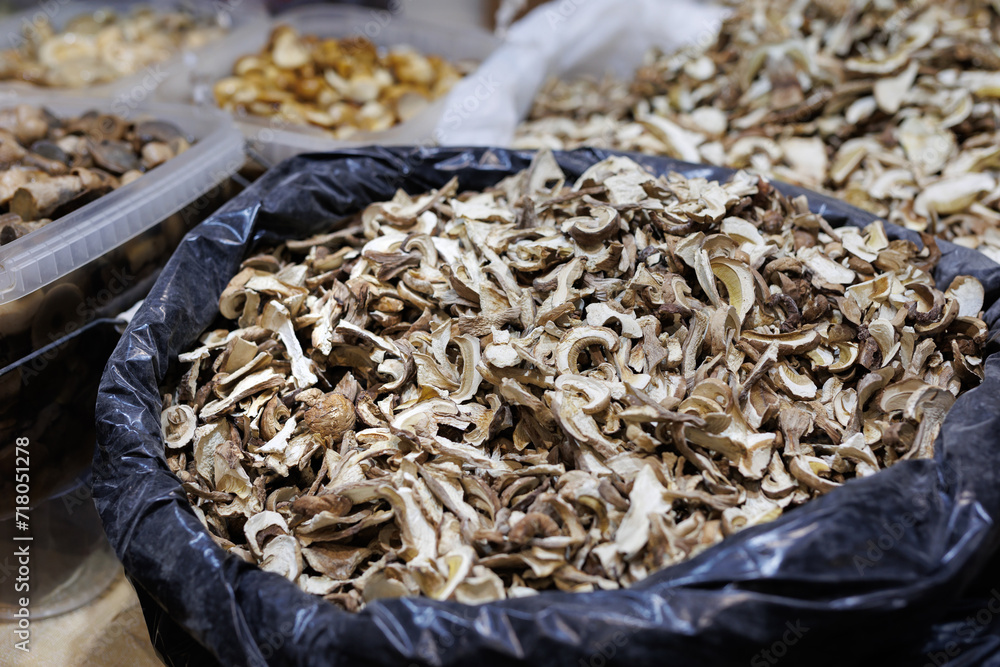 Sale of a mixture of dried mushrooms at the farmer's market.