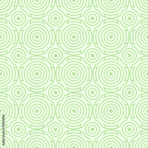 Green seamless background with circles and arcs, texture pattern for wallpaper and textile. Natural summer mosaic pattern of geometric shapes in trendy style. © Nadzeya Pakhomava