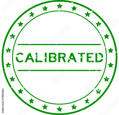 Grunge green calibrated word round rubber seal stamp on white background