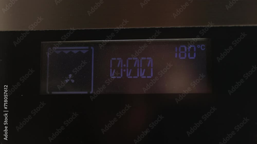 Timer clock on the kitchen oven. Cooking time, close-up. High quality 4k footage Timer clock on the kitchen oven. Cooking time, close-up. High quality 4k footage