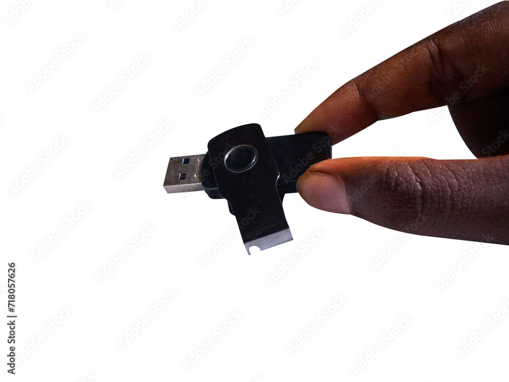 hand holding a flash drive