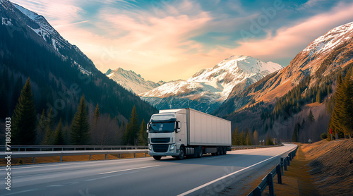 A truck drives along a mountain road, cargo delivery logistics © Enrique