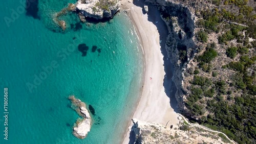 Aerial Wide Top View of Tourists Enjoying the Kaladi Beach with Crystal Clear Waters, Greece photo