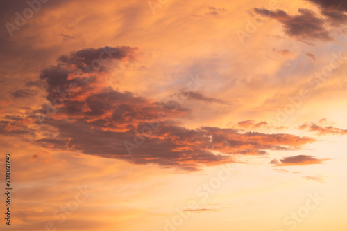 orange clouds in the sky at sunrise