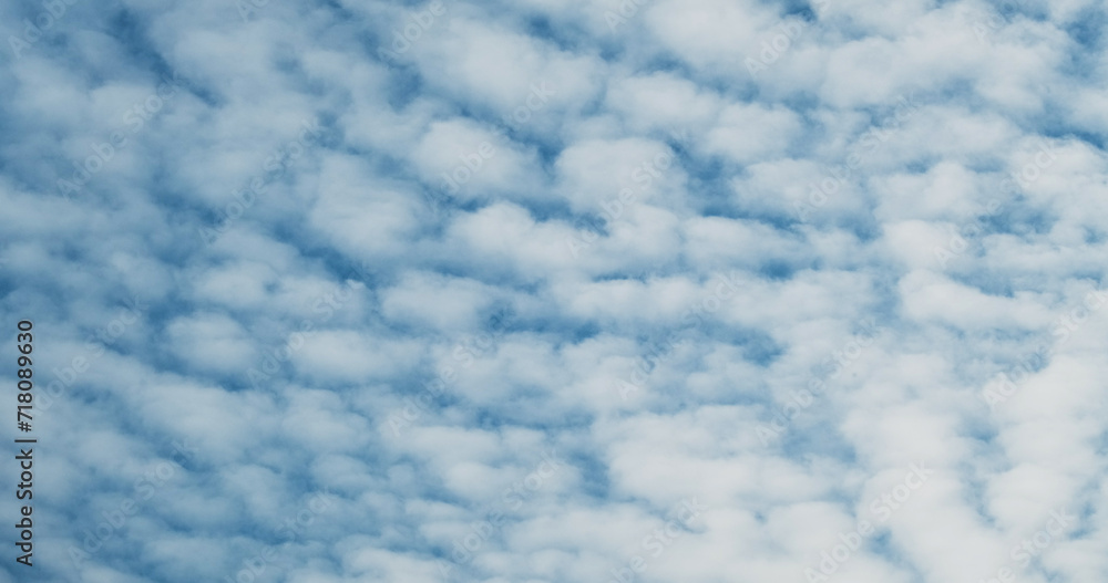 Small clouds on the blue sky, abstraction, background, surface movement. Small clouds on the blue sky, abstraction, background, surface movement.