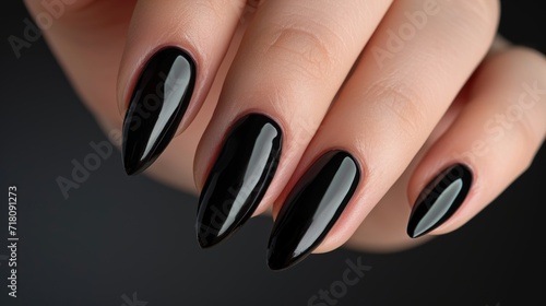 Sleek Black Manicure on Female Hands Closeup