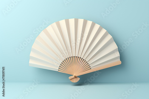 Wooden white open fan on a blue background. Generated by artificial intelligence photo