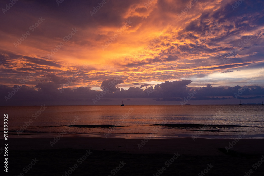 Orange sunset on the beach of Thailand