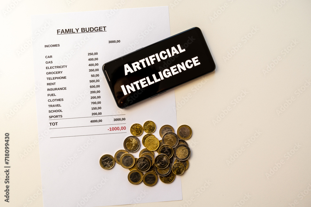 Family budget sheet, coins and artificial intelligence device. Use of artificial intelligence to manage monthly expenses.