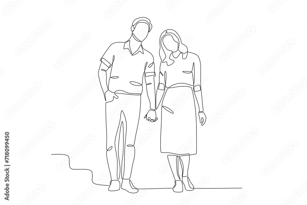 Couple holding hands