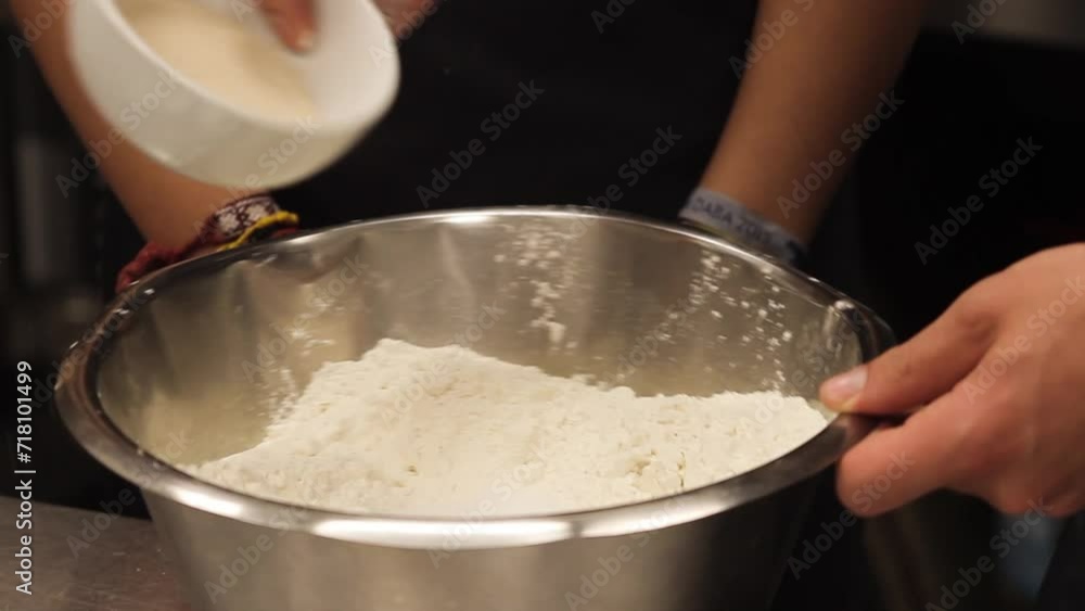 Following Close Up Shot of A Chef Teaching an Apprentice to Make Cake Batter Following Close Up Shot of A Chef Teaching an Apprentice to Make Cake Batter