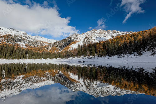 Autumn landscape on Palù lake, fine art photography