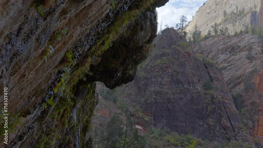 Establishing shot of mountains with red rocks in Weeping Rock, Zion National Park, Utah, North America. Day time. ProRes 422 HQ. Establishing shot of mountains with red rocks in Weeping Rock, Zion National Park, Utah, North America. Day time. ProRes 422 HQ.