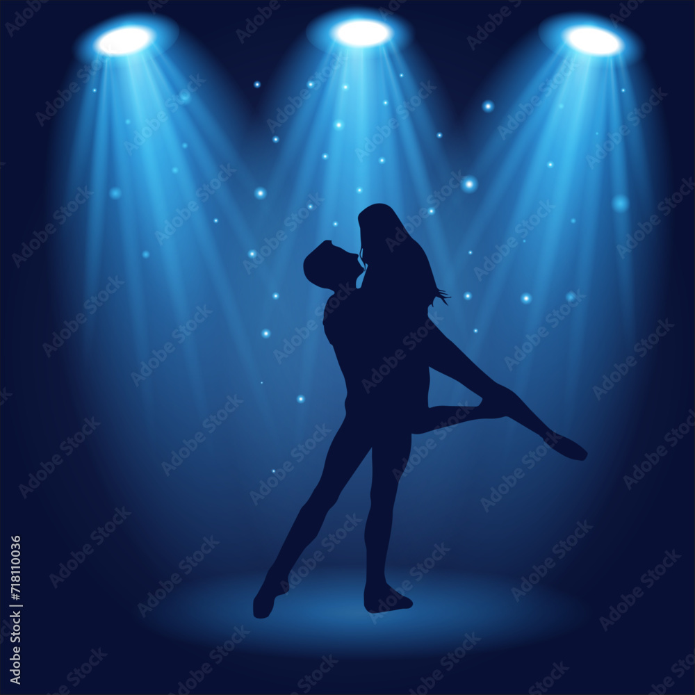 silhouettes dance couple under the spotlight; blue spotlight; dance couple; silhouettes