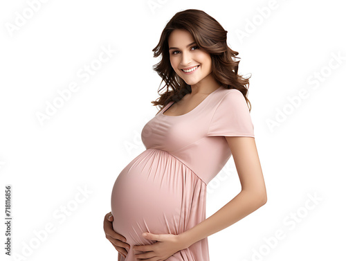 Pregnant woman in a white dress smiling, showcasing her beautiful baby bump