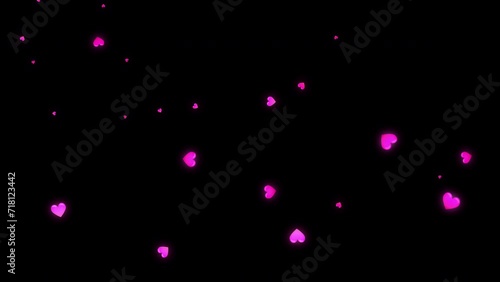 Simple pink hearts exploding transition on black background