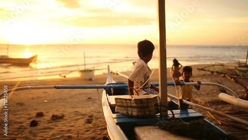 Asian Children Playing on a Tropical Sunset Beach, Philippines. photo