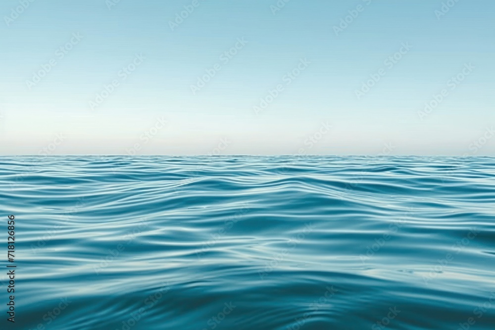 a flat and smooth water wave with blue sky over it a flat and smooth water wave with blue sky over it