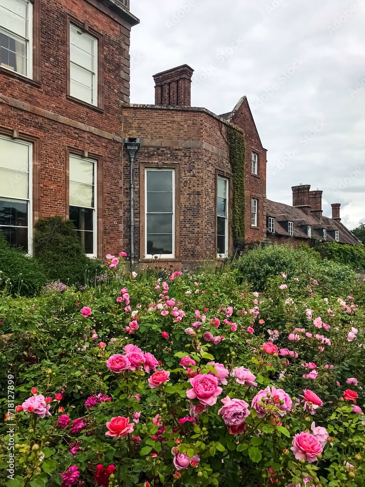 brick house with flowers