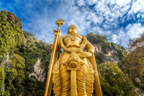 Photography The golden buddha in front of the Batu Caves in Kuala Lumpur, Malaysia