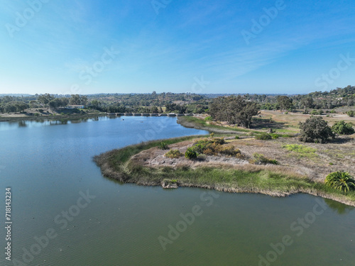 Aerial view over water reservoir and a large dam that holds water. Rancho Santa Fe in San Diego  California  USA