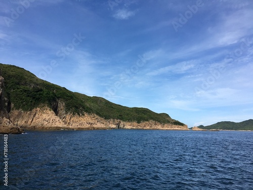 island in the sea, blue sky, harbour